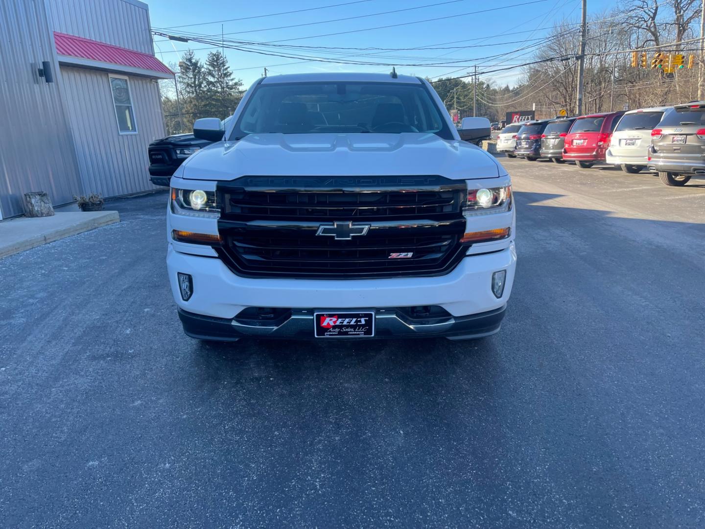 2017 White /Black Chevrolet Silverado 1500 LT Z71 Double Cab 4WD (1GCVKREC8HZ) with an 5.3L V8 OHV 16V engine, 6-Speed Automatic transmission, located at 11115 Chardon Rd. , Chardon, OH, 44024, (440) 214-9705, 41.580246, -81.241943 - Photo#1